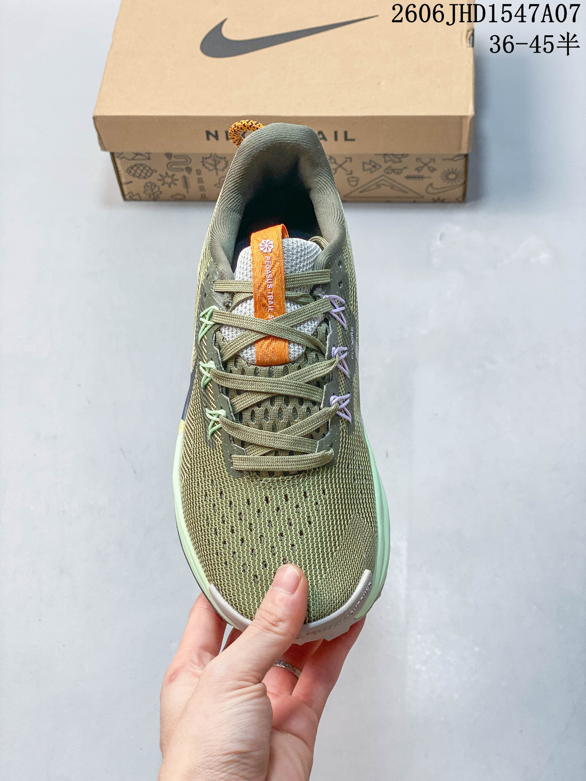 Top view showing the shoe’s laces, tongue, and patterned upper.
