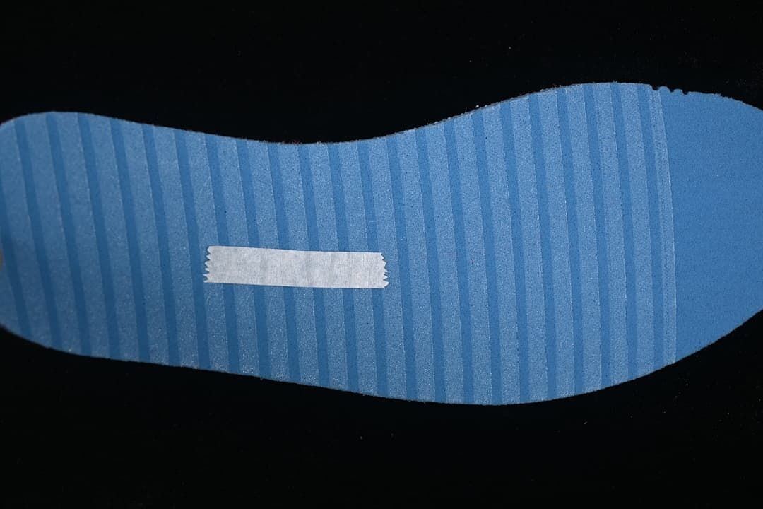 Blue striped shoe insole shown separately.