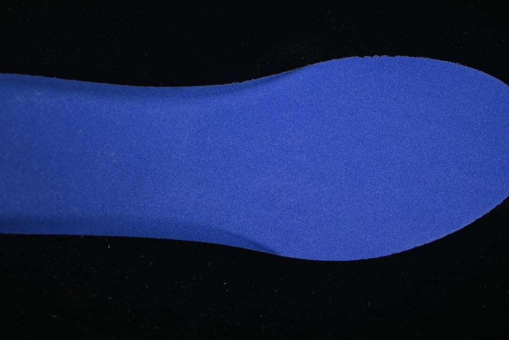 Blue insole shown separately against a dark background