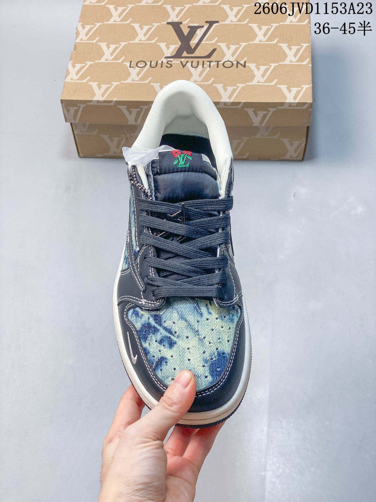 Top view showing blue patterned toe panels and dark laces