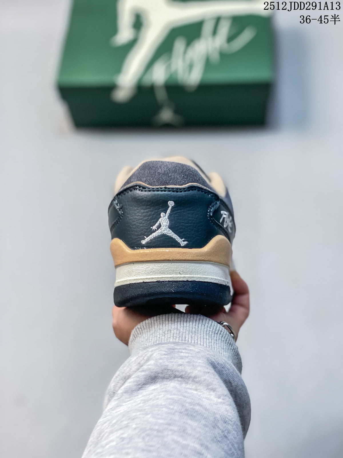 Rear view of a Jordan Flight Court ATE sneaker with a Jumpman logo and tan and cream accents