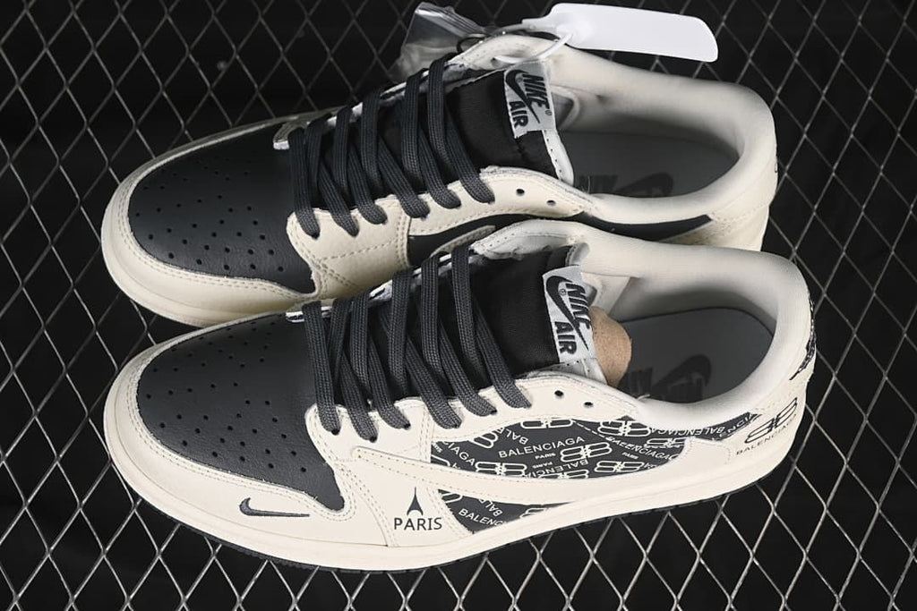 Overhead view of a pair of off-white and black low-top sneakers with black laces and printed side panels.