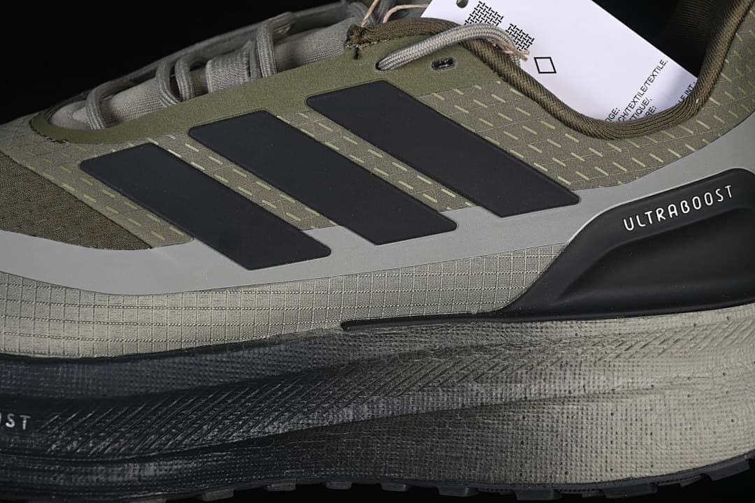 Close-up of the side stripes, heel detail, and layered midsole
