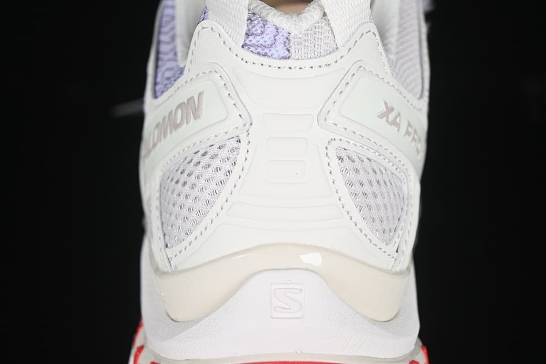 Rear view highlighting the heel structure and Salomon branding.