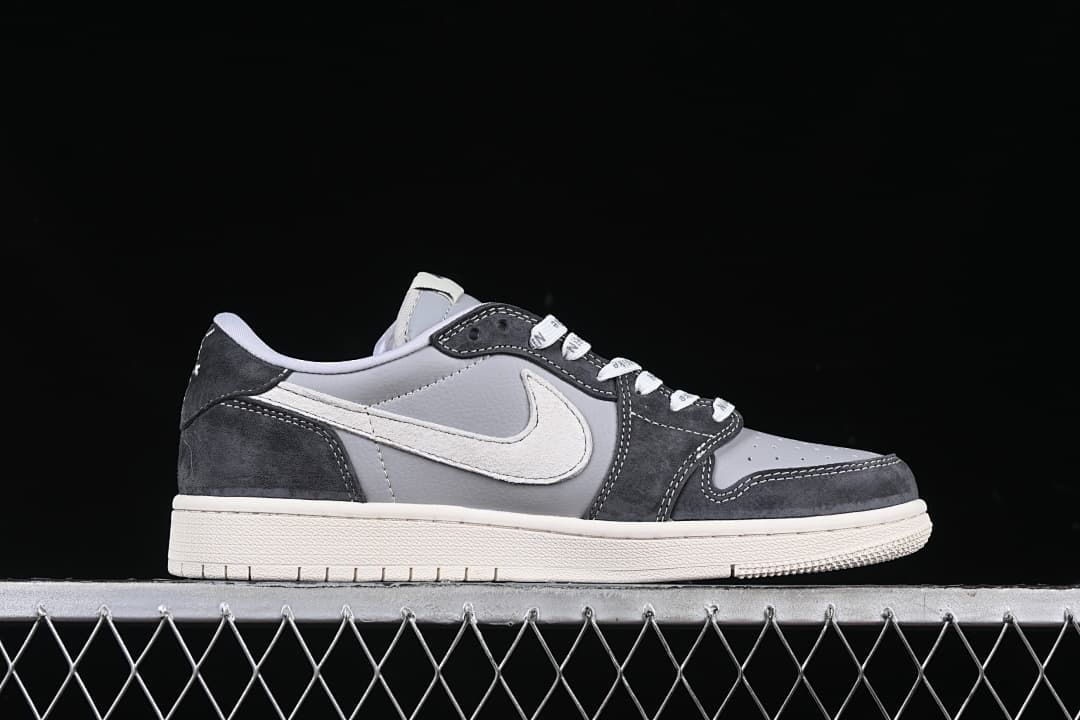 Side profile of a grey and charcoal low-top sneaker