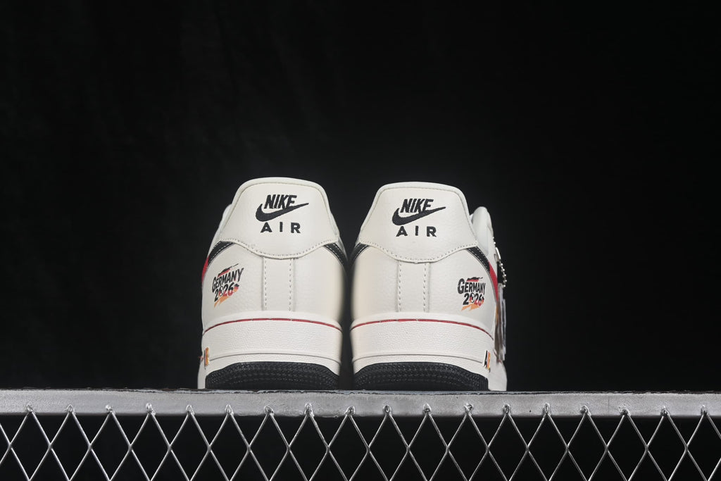 Rear view of the pair showing Nike Air branding and Germany 2026 heel graphics.