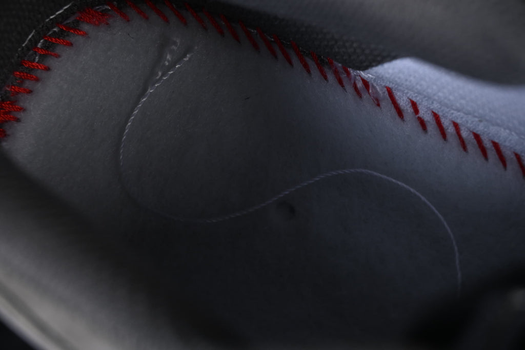 Close-up of stitched detailing on the sneaker upper