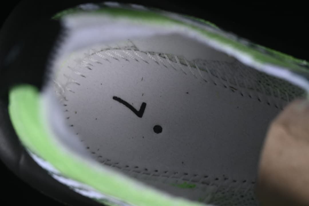 Close-up of the shoe interior showing a printed size mark