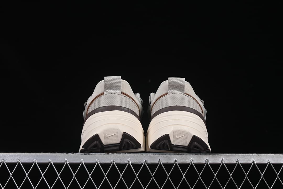 Rear view of both sneakers showing heel details