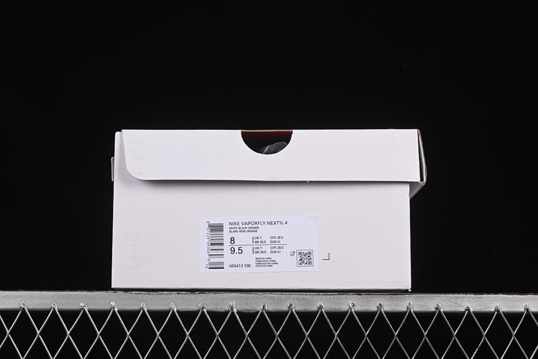 Shoe box label identifying Nike Vaporfly Next% 4 and showing size information.