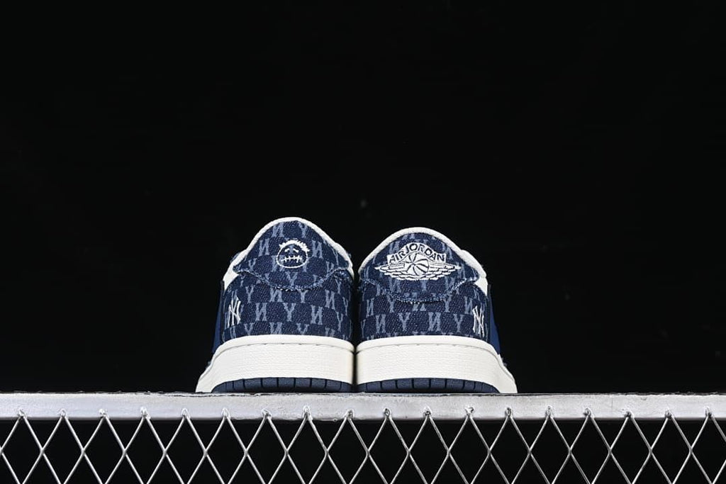 Rear view of both sneakers with contrasting heel details