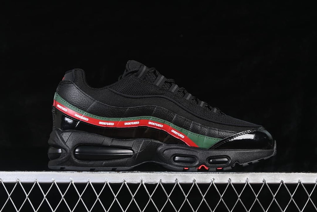 Side profile showing layered black panels, red-and-green branding, and Air units
