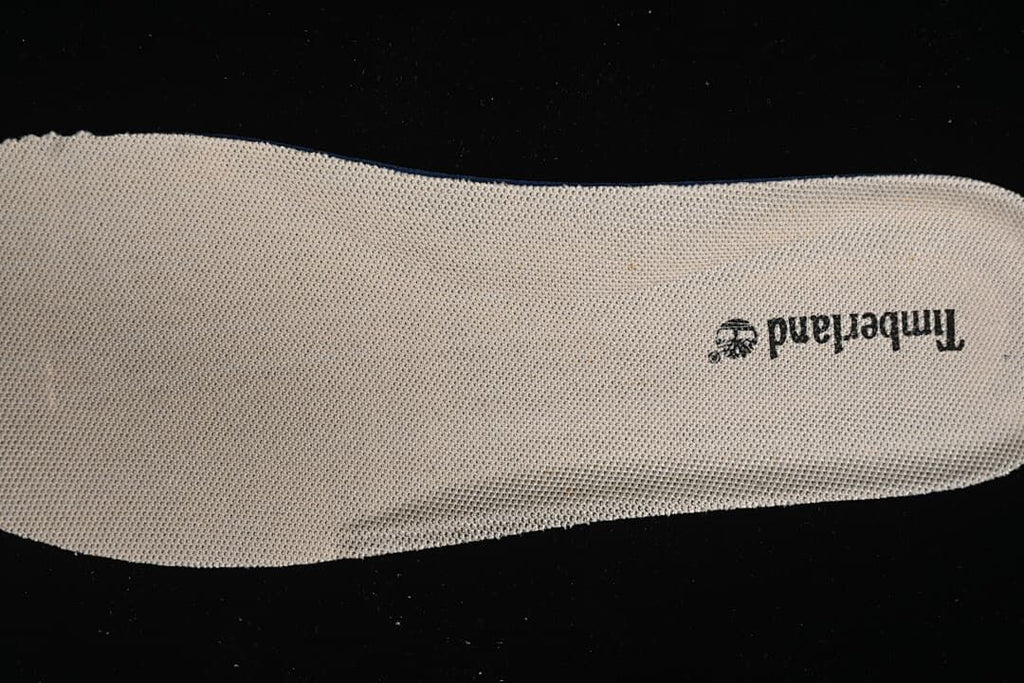 Close-up of the insole with Timberland branding.