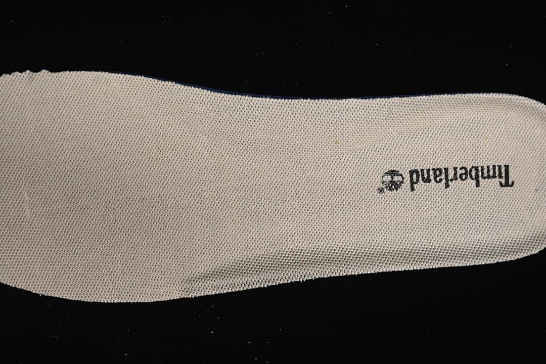 Close-up of the insole with Timberland branding.
