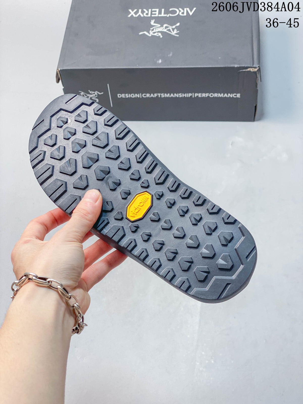Close-up of the patterned outsole on a dark gray slip-on shoe
