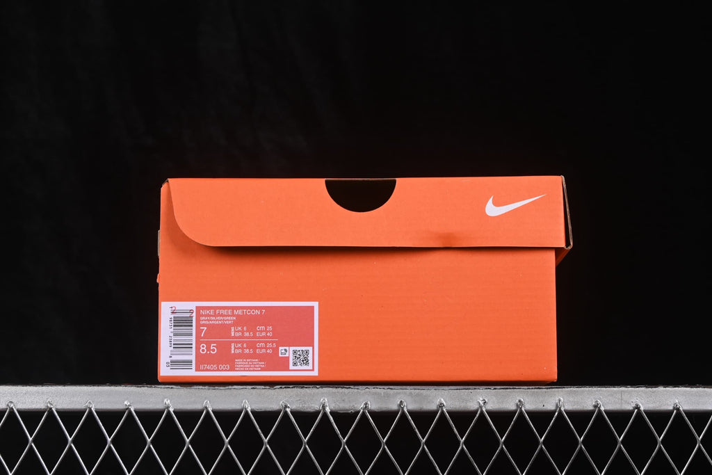 Orange Nike shoe box with a label showing Nike Free Metcon 7, style code II7405-003 and size information.