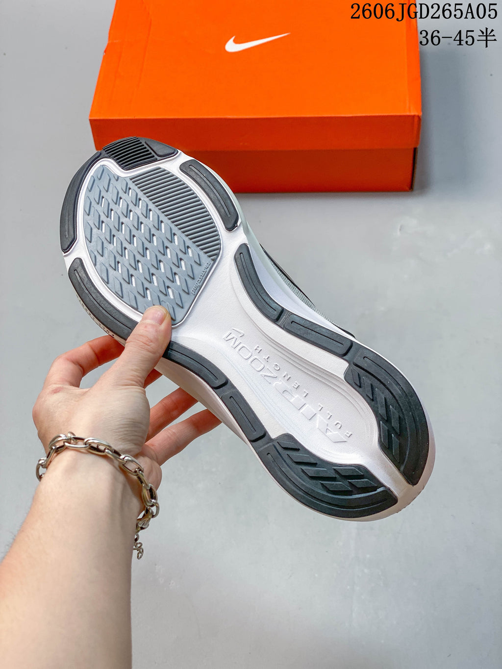 Underside of a Nike Pegasus 42 shoe showing its patterned outsole