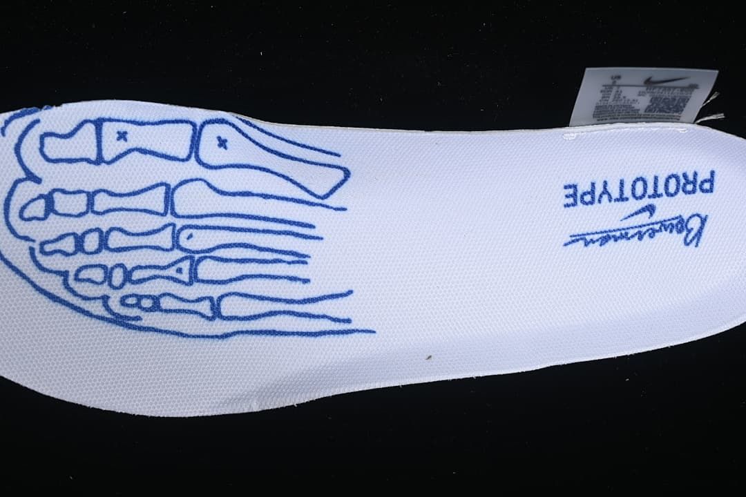 White insole with blue skeletal foot illustration and Prototype marking.