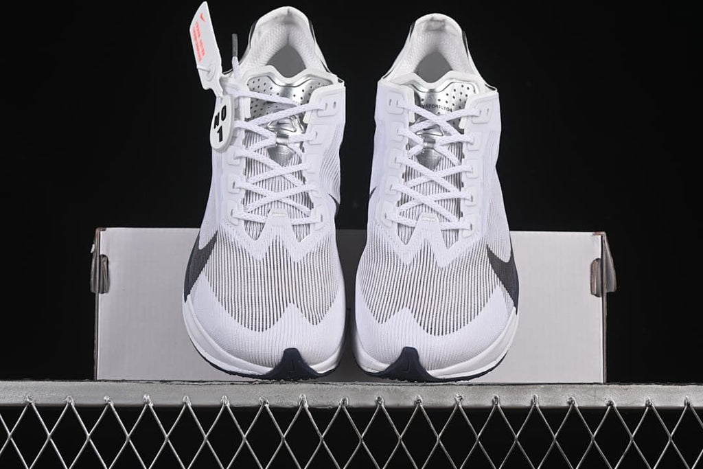 Front view of the pair displayed on a white shoe box.