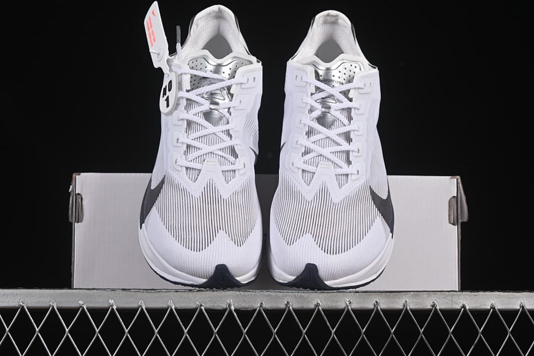 Front view of the pair displayed on a white shoe box.