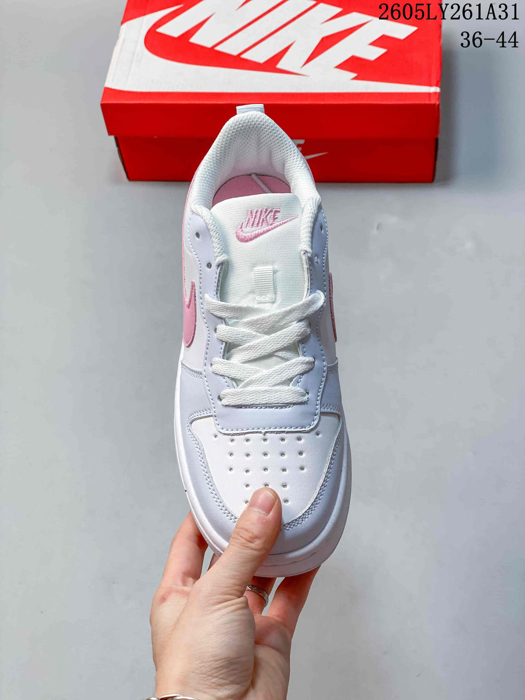 Top view showing white laces and perforated toe