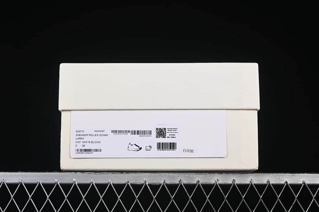 Shoebox label displaying sneaker details and size 38.