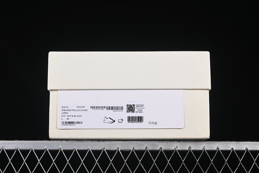 Shoebox label displaying sneaker details and size 38.