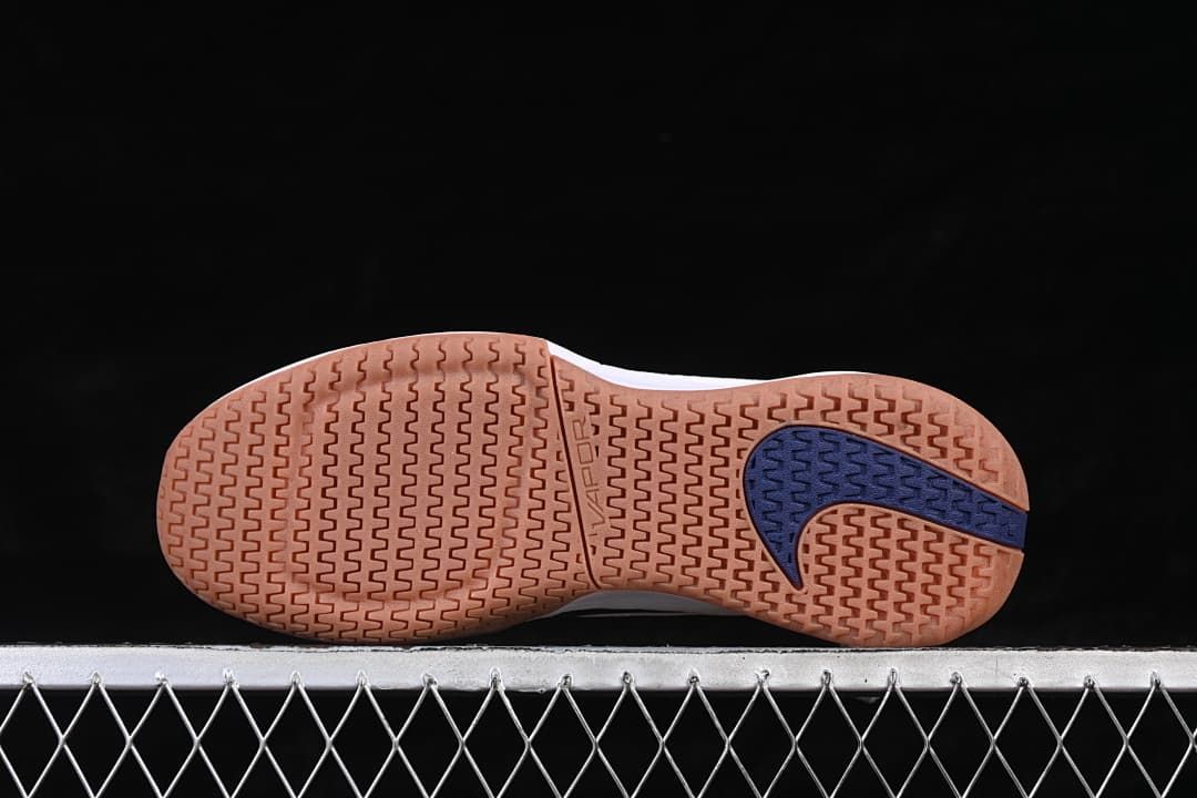 Underside view showing the gum-colored outsole and patterned tread.