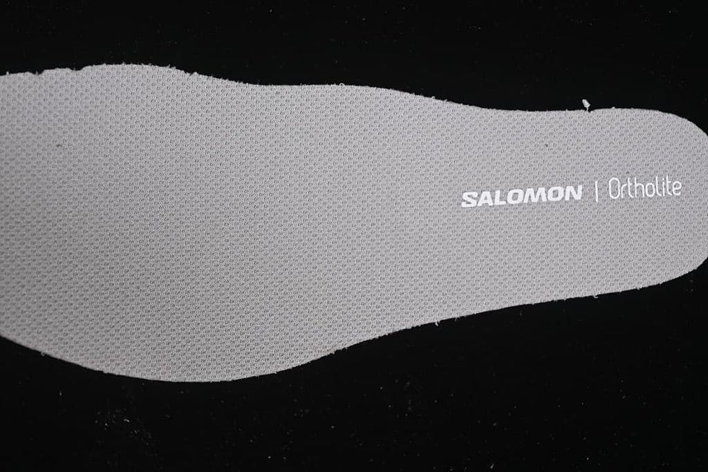 Close-up of the insole with Salomon and Ortholite branding