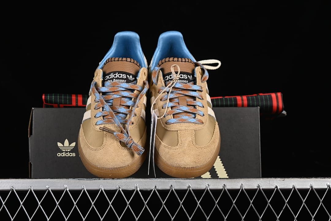 Front view of the pair with patterned laces and blue collars