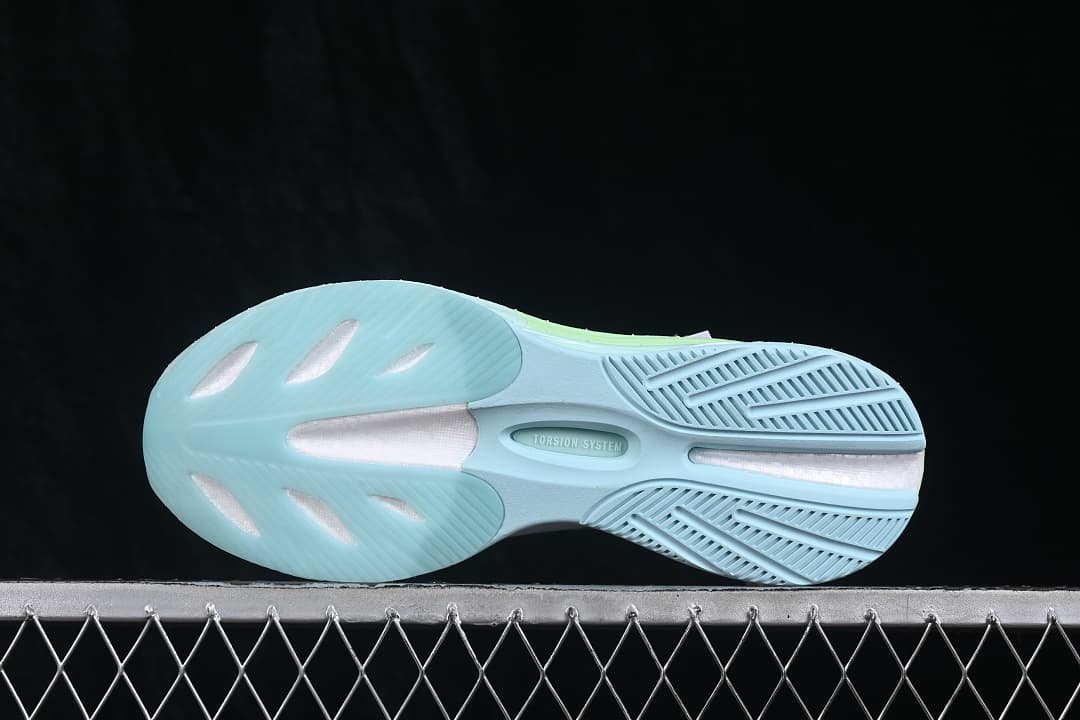 Underside view showing the patterned sneaker outsole