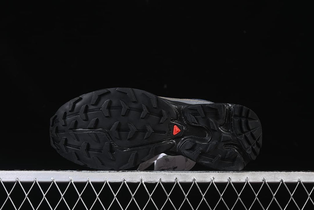 Underside view showing the lugged black outsole