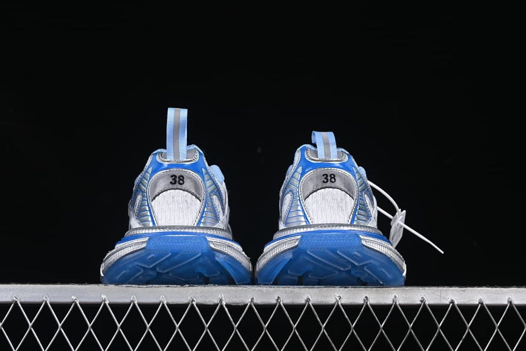Rear view of both sneakers with blue heel sections