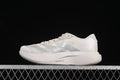 Side view of an off-white Adidas Adizero Evo SL running shoe against a dark background