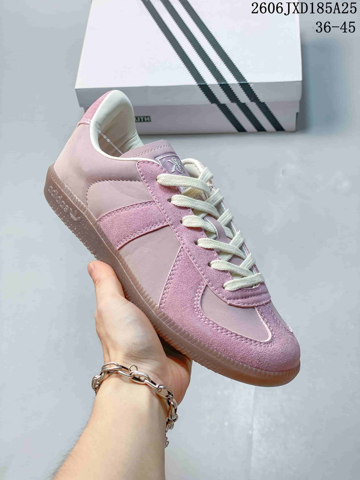 Side view of a pink adidas BW Army sneaker showing contrast panels and a gum-colored sole.