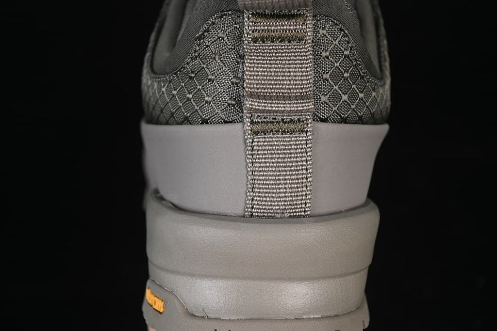 Rear view showing the heel pull loop and layered sole