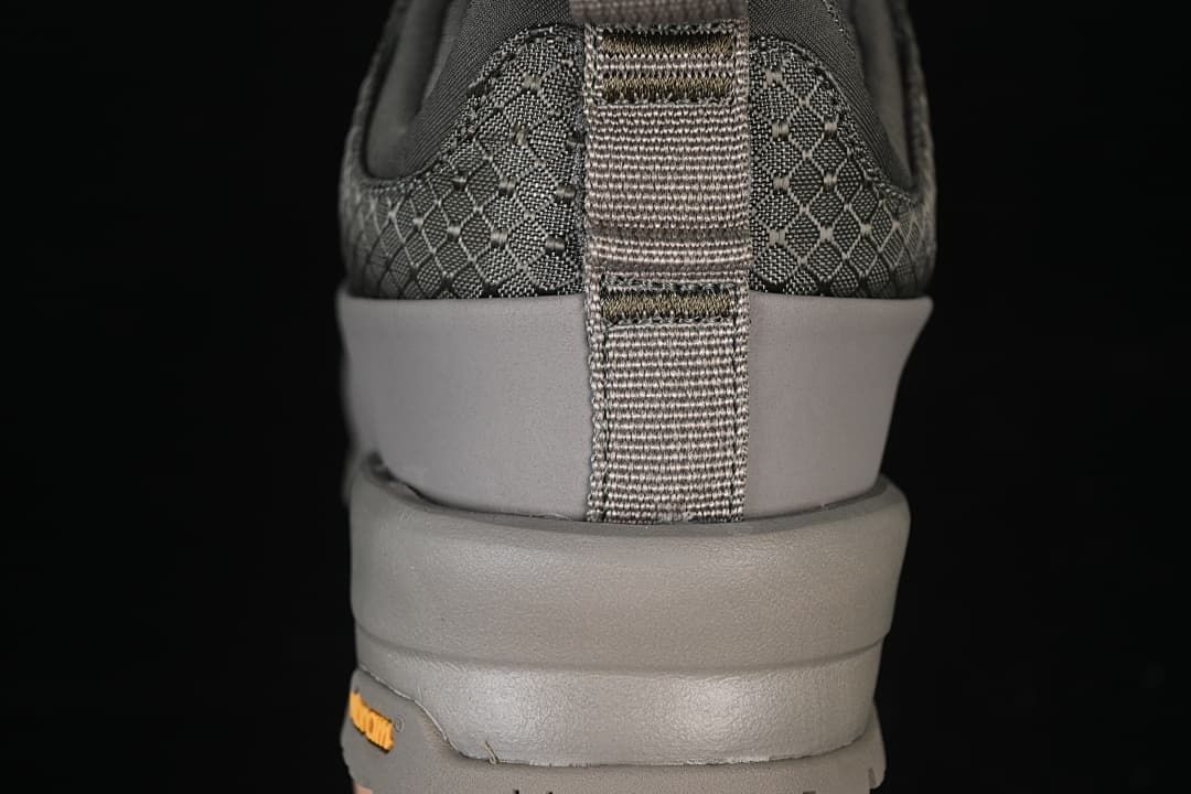 Rear view showing the heel pull loop and layered sole