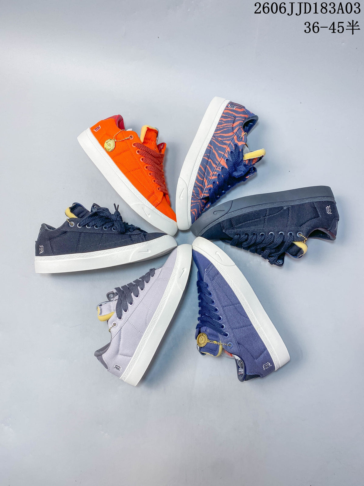Several low-top sneakers arranged in a circle, showing assorted colors and patterns