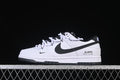 Side view of white and black Nike SB Dunk Low sneakers with layered laces