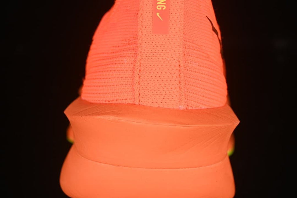 Rear view showing the heel and sculpted sole