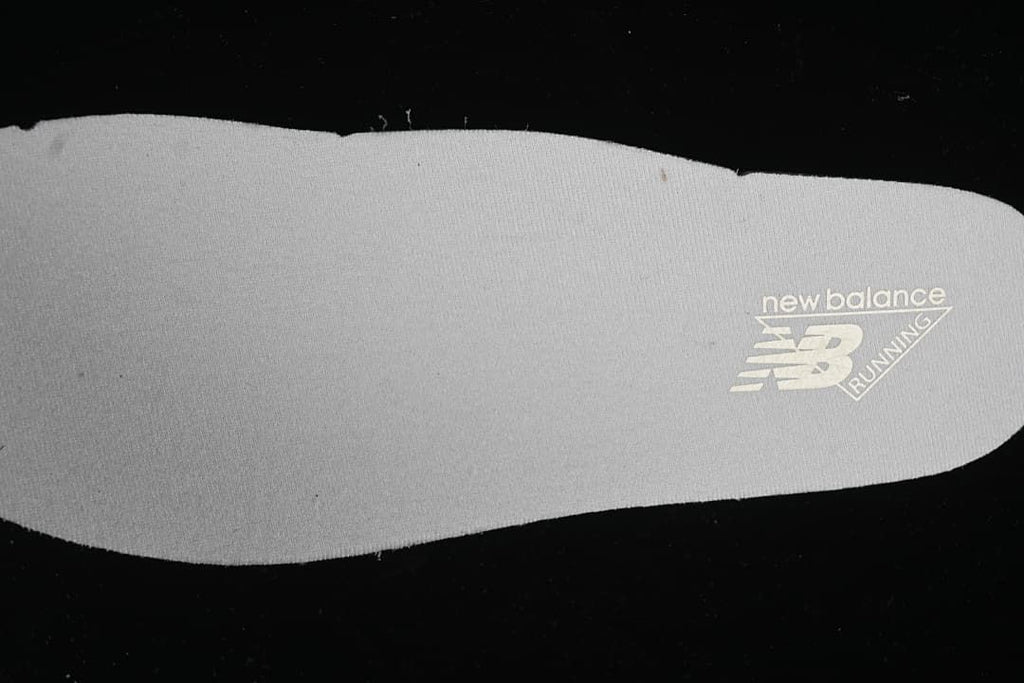 Insole showing New Balance Running branding