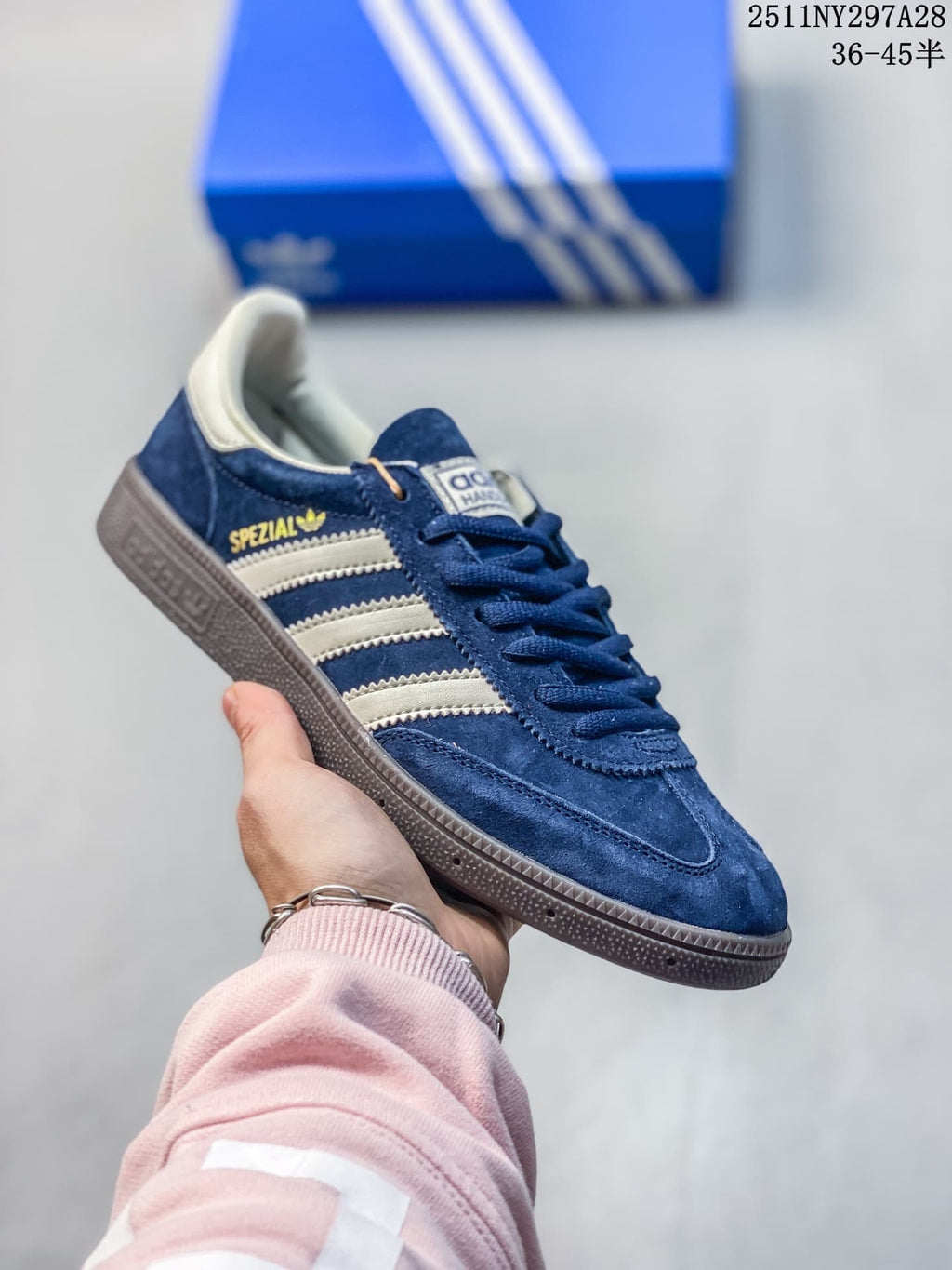 Blue Adidas Spezial-style sneaker with light stripes and gray outsole