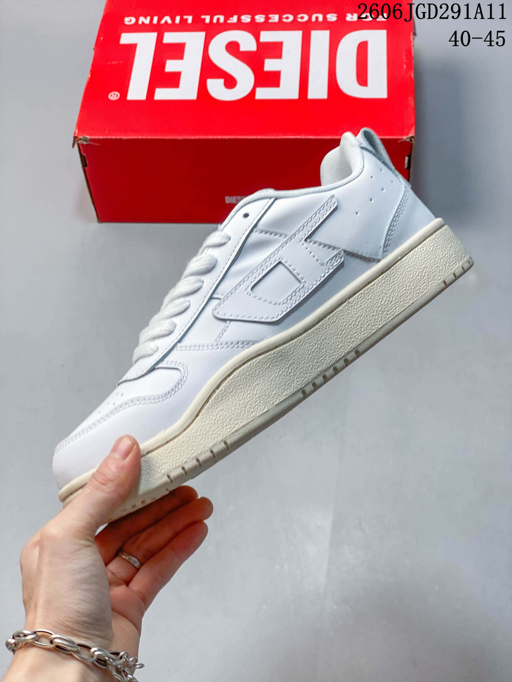 Side view highlighting the logo detail and low-top profile.