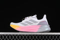 Side view of white Adidas Ultraboost 5X shoes with grey stripes and a pink and yellow midsole