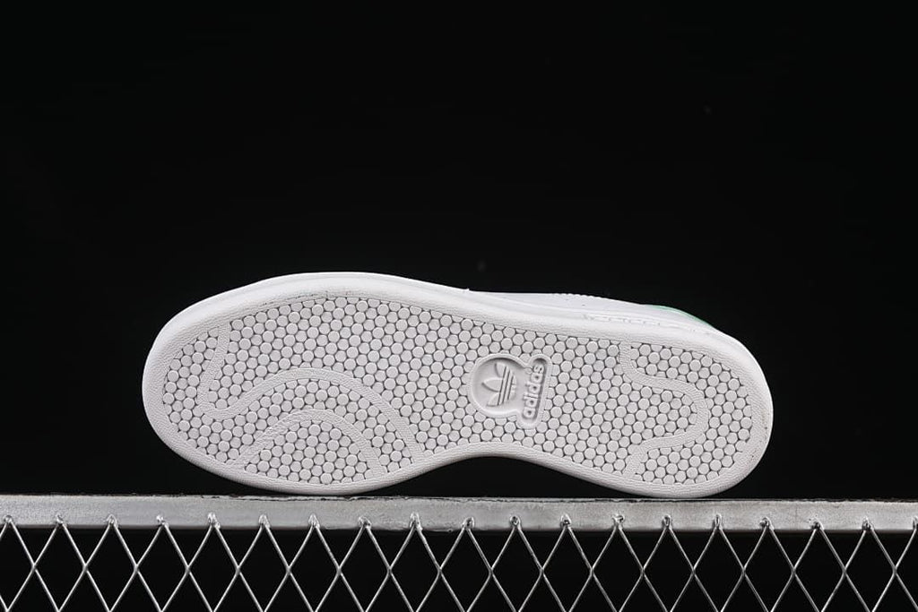 Underside showing the patterned rubber outsole