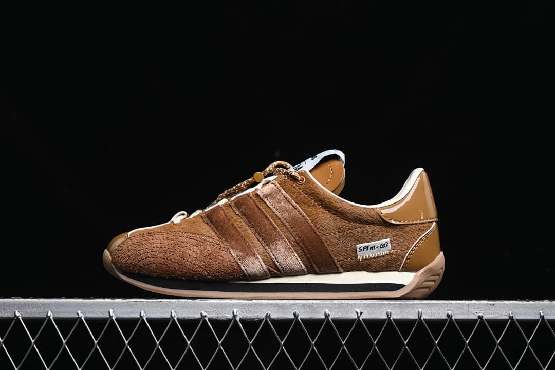 Side profile of a brown adidas Country OG SFTM sneaker