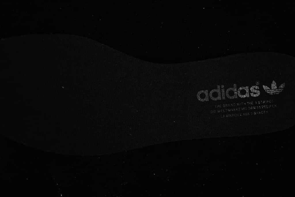Close-up of the branded black insole