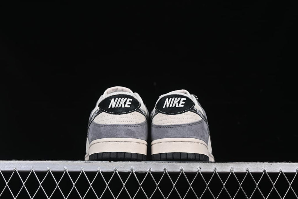 Rear view of both shoes with black heel tabs