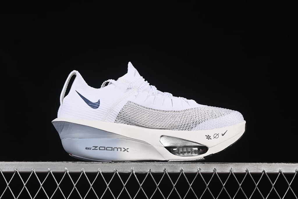 Side view highlighting the white and gray midsole and forefoot cushioning window