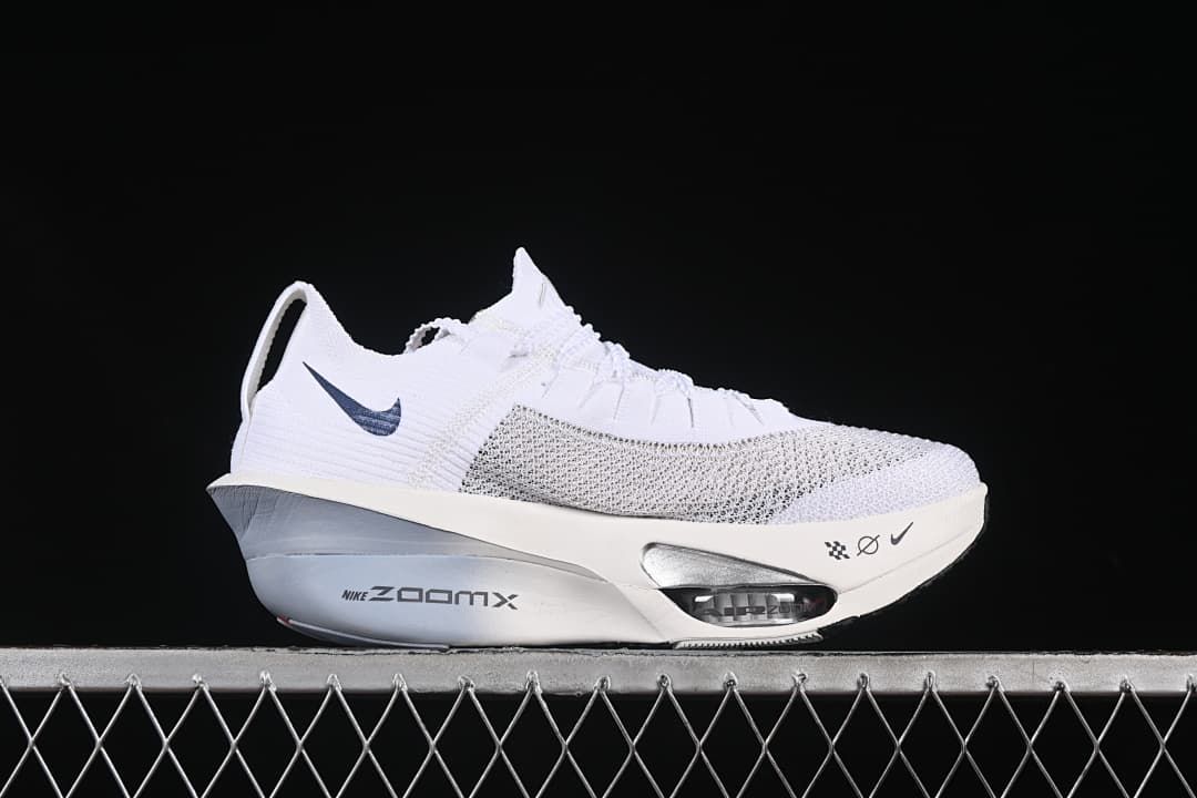 Side view highlighting the white and gray midsole and forefoot cushioning window
